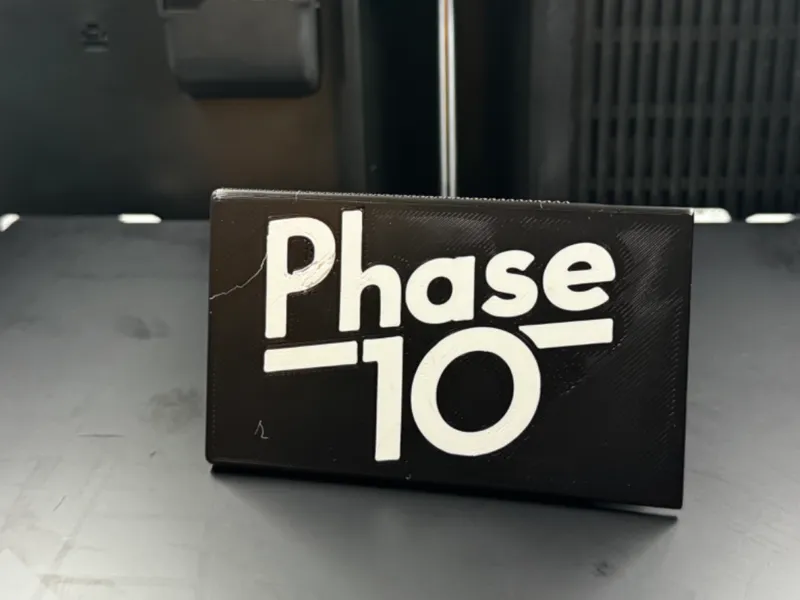 Phase 10 box with snapping slide-lid