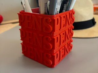 Pen holder with typographic design