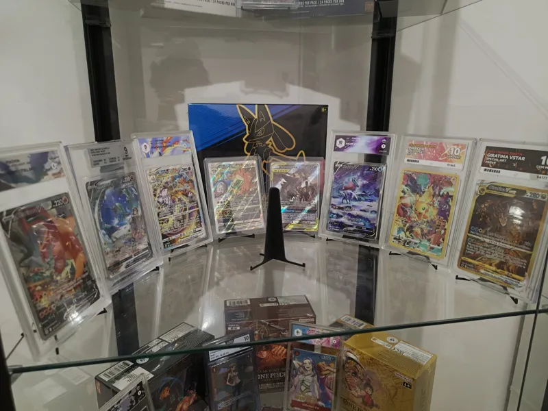 Trading card stand with X legs base