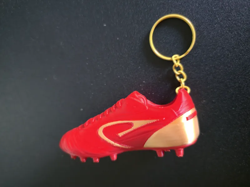 Scarpetta da calcio bicolore portachiave