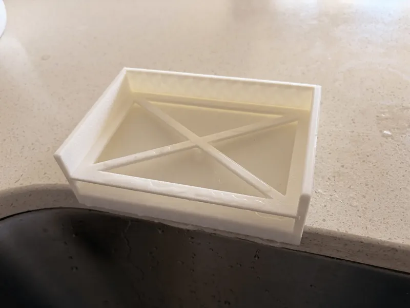 Kitchen sponge holder with replaceable tray