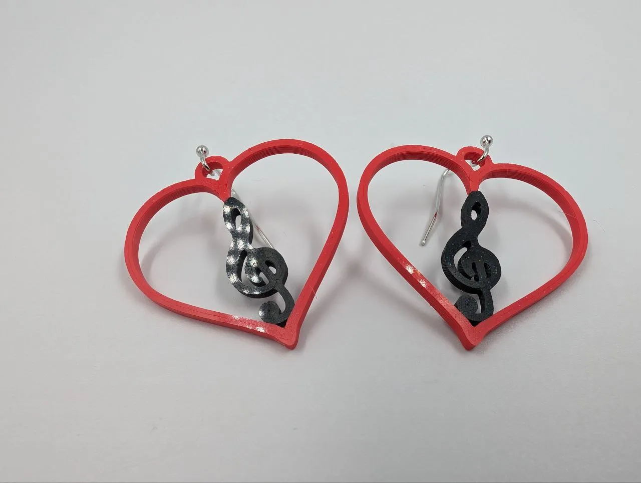 Treble clef heart earring view 4