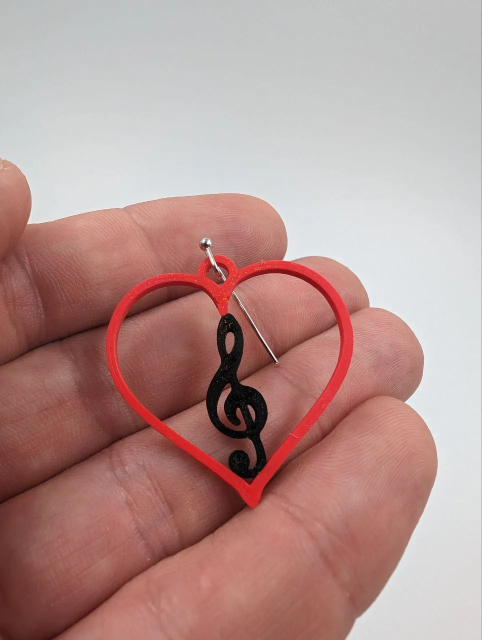 Treble clef heart earring view 3