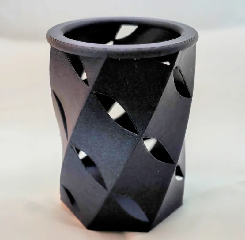 Leaky concentric helical pencil holder