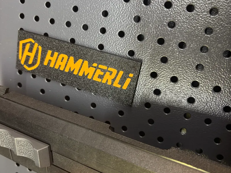 HAMMERLI logo on a magnet