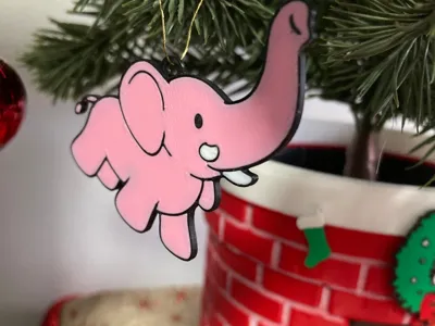 Bad santa Thurman’s pink elephant ornament 