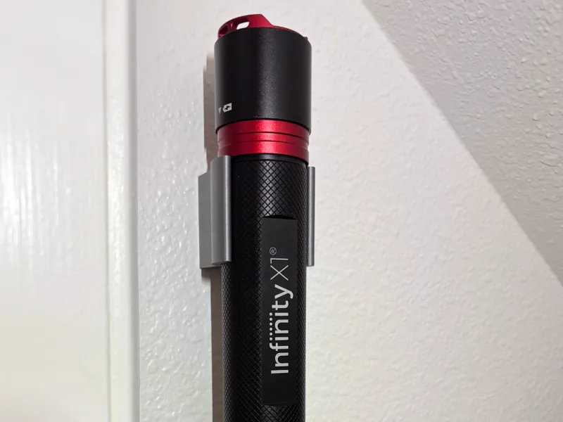 Infinity X1 Flashlight wall clamp