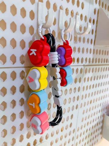 Objeto manipulable: flexi heart modular fidget clicker — vista de referencia 4