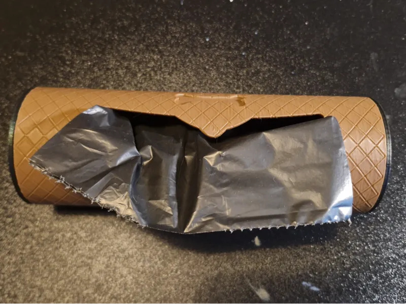 Dog bag poo holder for walls