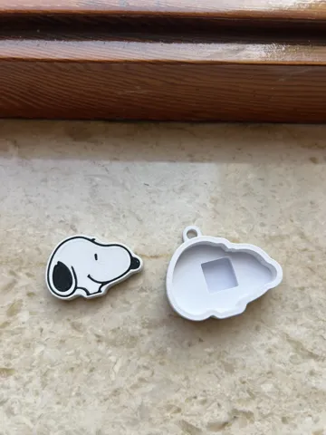 Objeto manipulable: Clicker Snoopy — vista de referencia 3