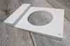 6.75 inch siding, .75 inch depth, 4 inch hole