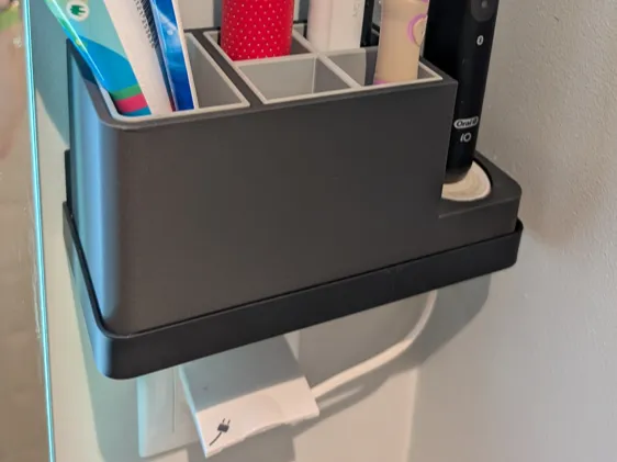 Toothbrush holder with Oral-B charger base slot
