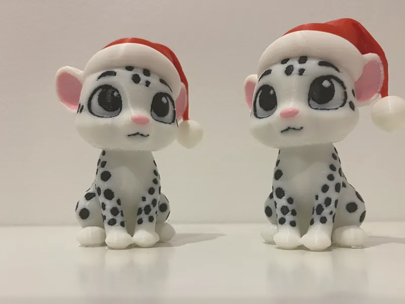 Festive Snow Leopard With A Santa Hat