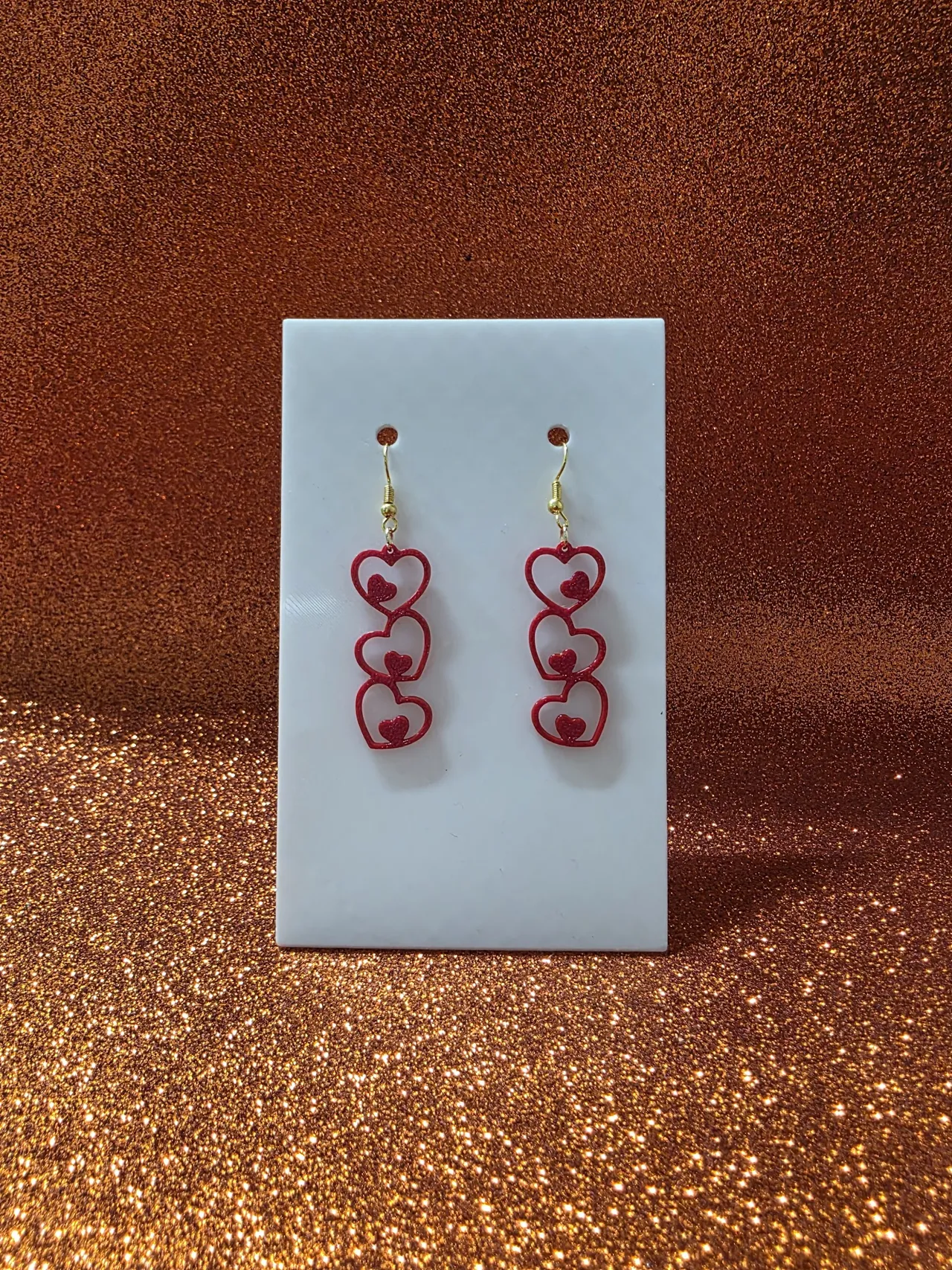 Triple love nest earrings view 2