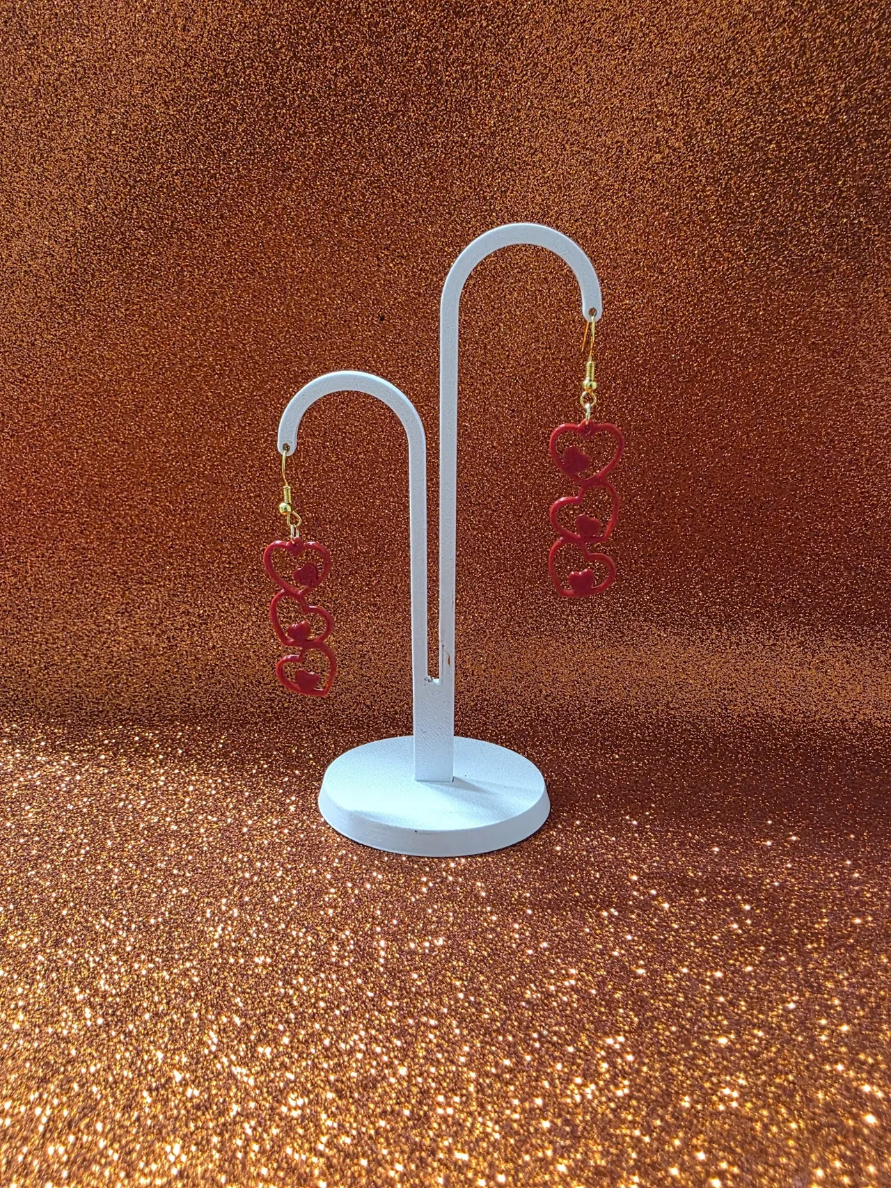 Triple love nest earrings view 3