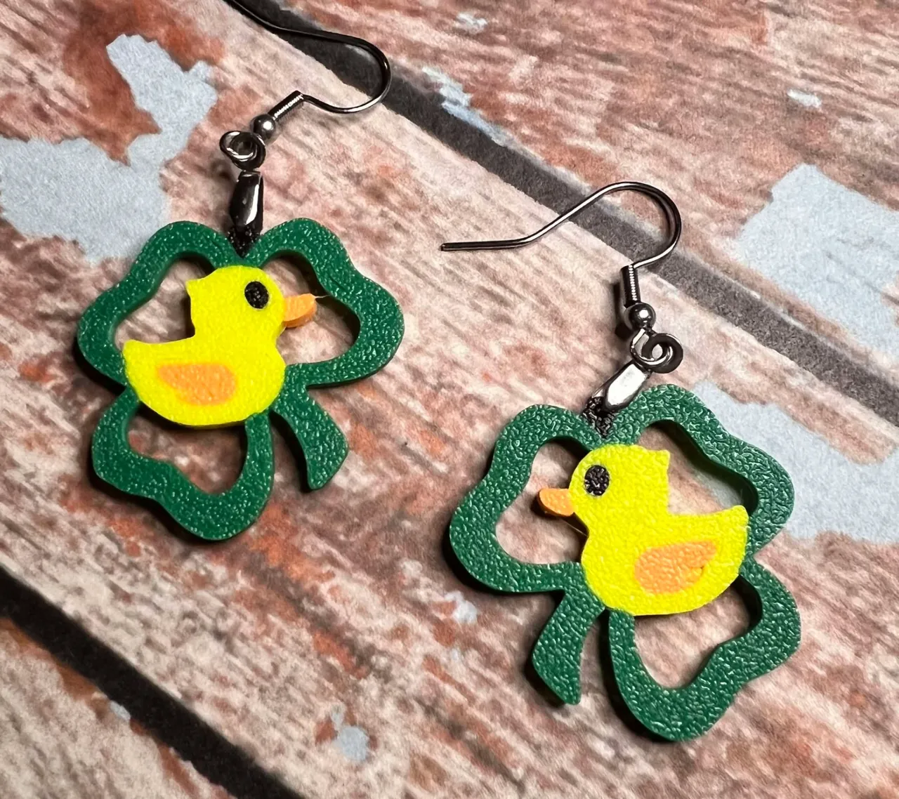 shamrock frame with duck earrings view 2