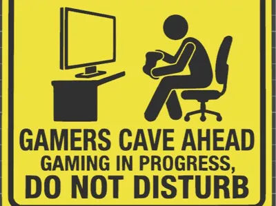 CAUTION: Gamers Cave Ahead, Gaming in Progress