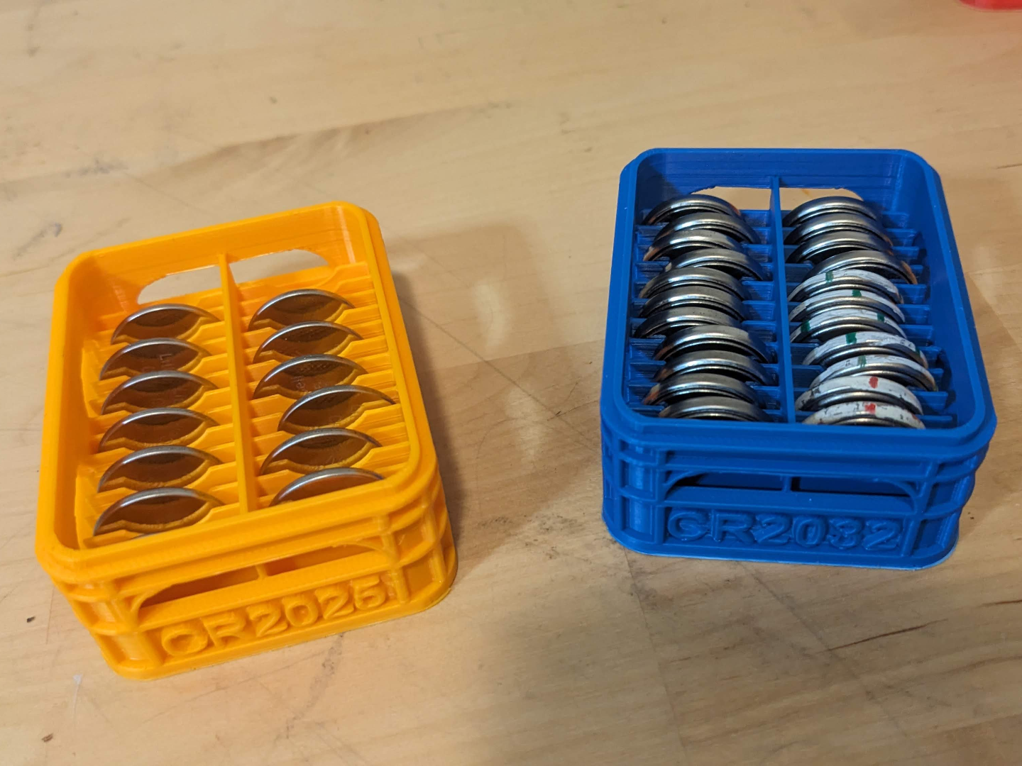 Half-height stackable battery crate CR2032