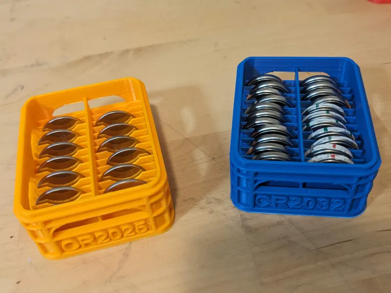 Half-height stackable battery crate CR2032