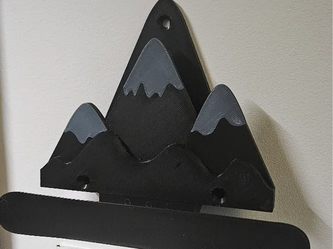 Snowboard wall hanger 