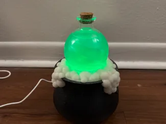 Swirling Potion Lamp with Cauldron