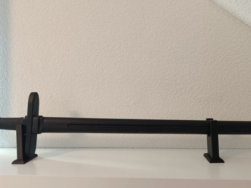 Universal stand for swords or big knifes 