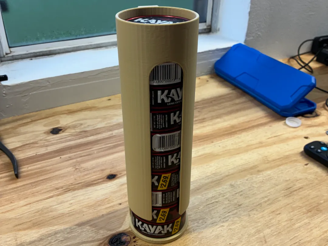 Distributeur de boîtes de tabac à chiquer