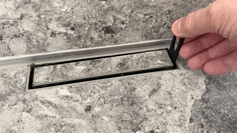 Shower drain hook