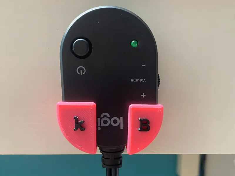 Logitech 50w speaker remote holder.
