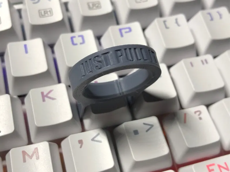 Just pull it keycap puller