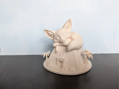 Sleeping Fennec Fox on Pyramid
