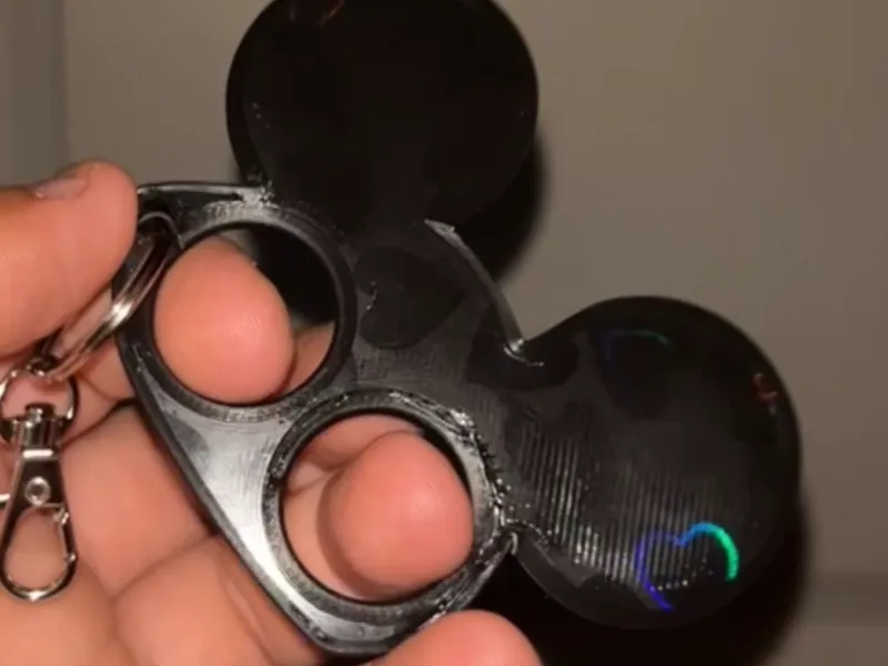 brass knuckles mickey key chain