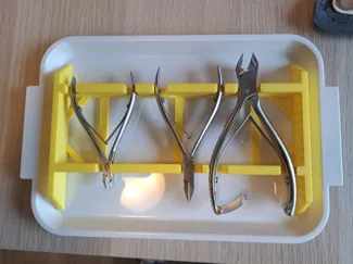 Halterung für Nagelscheren