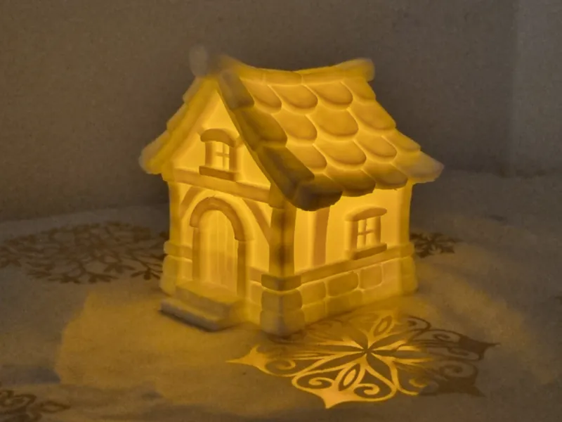 Weihnachtslandschafts Hütte mit Brücke