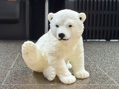 Cute sitting baby polar bear: Realistic fur texture recreated