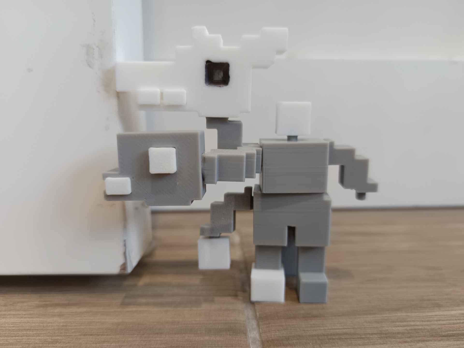 Articulated 8-bit mangle figure.