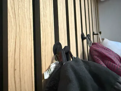 Acoustic Panel Hooks for Jackets and Hats 