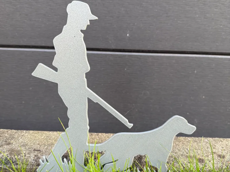 Jäger mit Hund Dekoration für den Garten