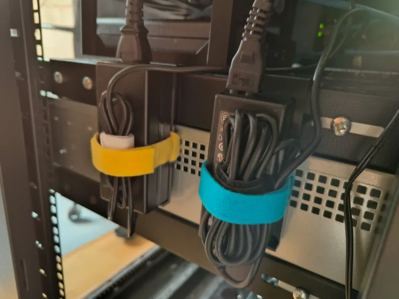 Power brick Ac-adaptor mounting bracket