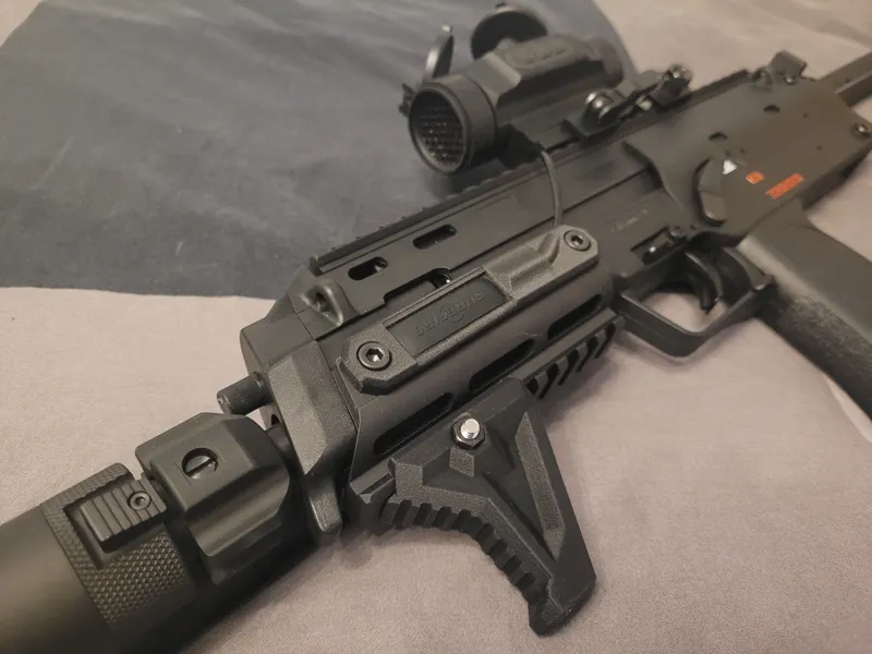 Surfire button cover for H&K MP7