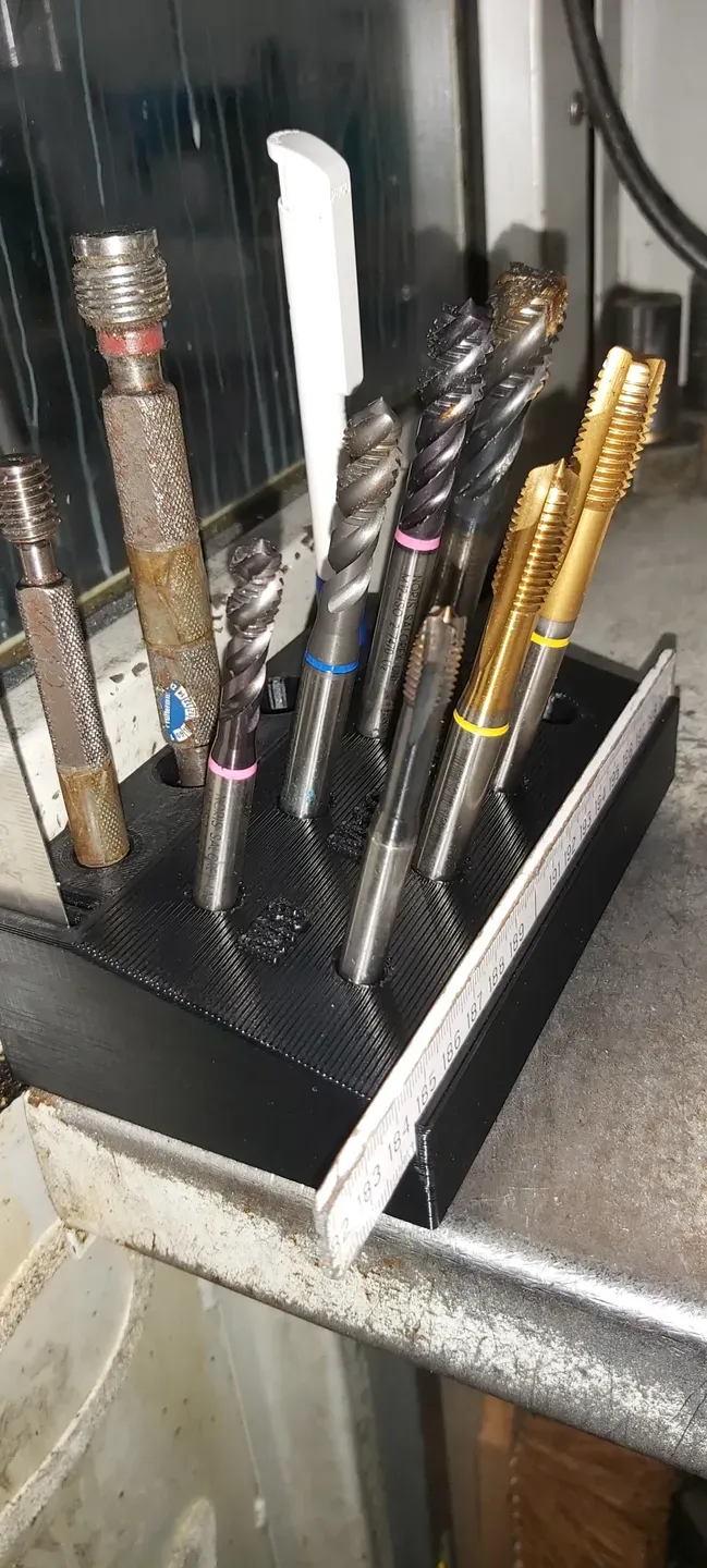 Tap holder