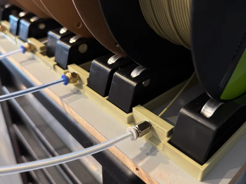 Spool roller base with bottom feeder. Modular.