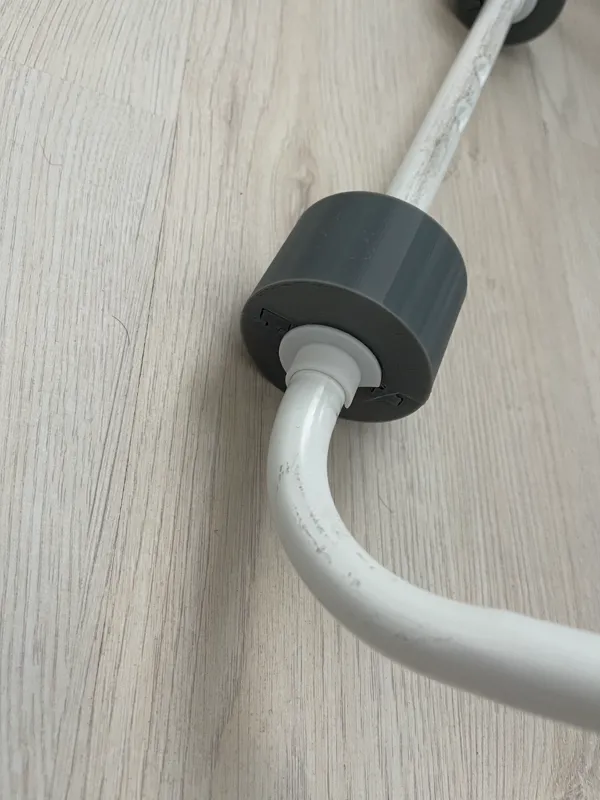 Butée pour roulettes d'étendoir à linge
