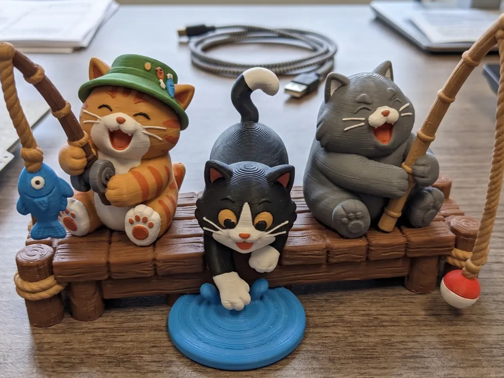 Modelo para impresión 3D: Cats fishing on dock - 8 colors. Referencia del modelo original.