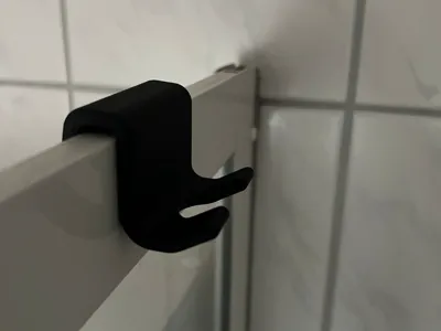 Shower holder for razors, squeegees, etc.