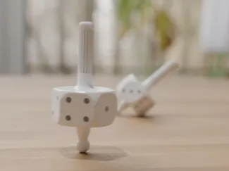 SpinDice – A Spinning Dice Top with a Twist