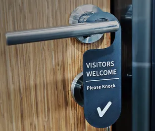 Visitors Welcome Sign