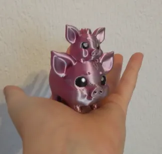 Funny piglet riding pig