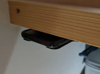 Under desk phone holder - no distraction