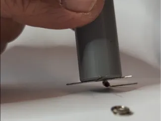 Magnetic pickup and release tool